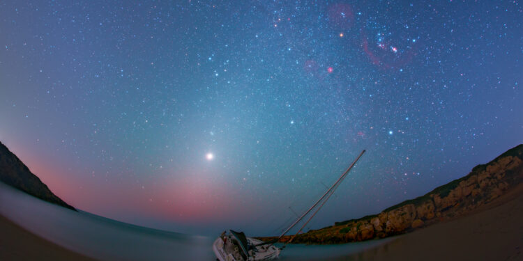 La magia del cielo di inverno nello scatto di Dario Giannobile a Calamosche